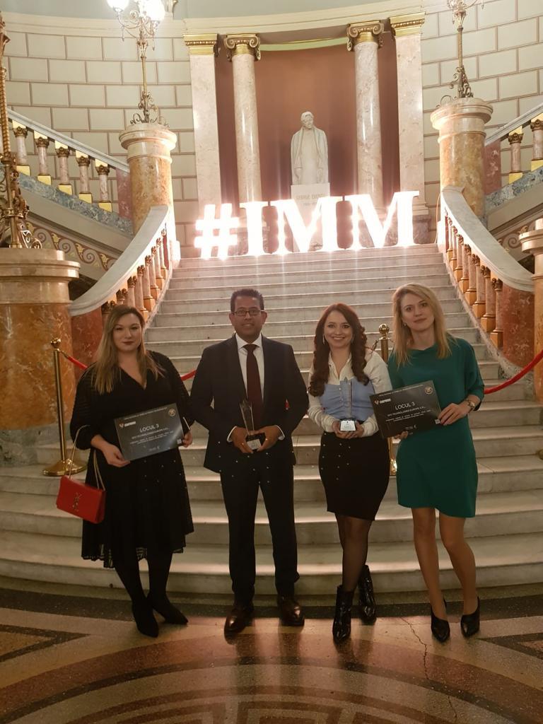 DCV team accepting an award at the IMM ceremony